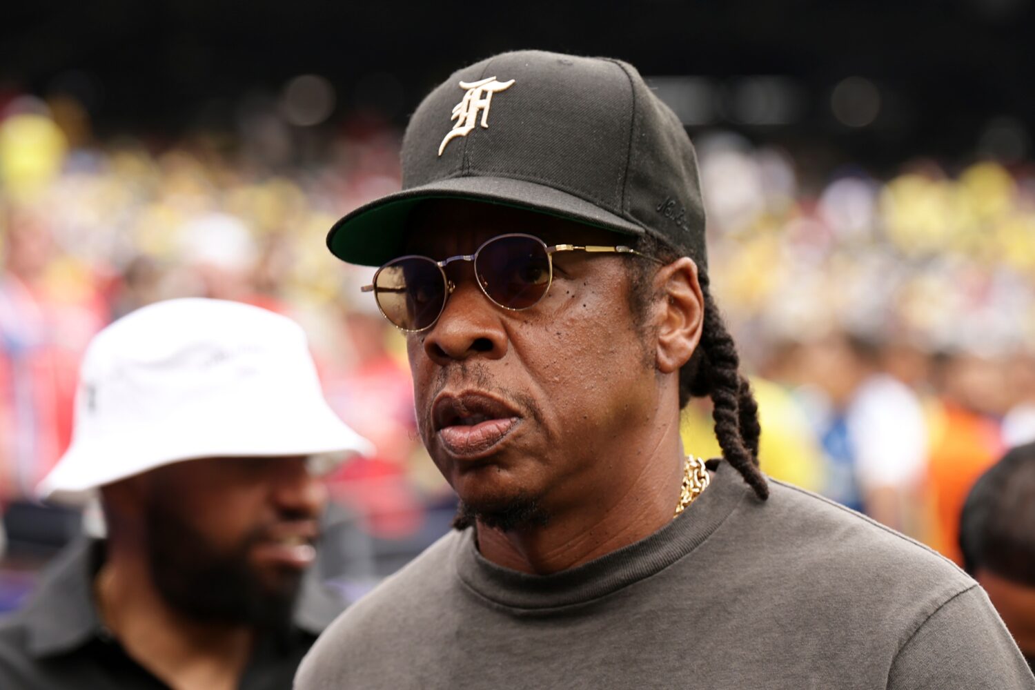 Jay-Z looks on ahead of the start the World Cup round of 16 soccer match between Brazil and Norway ...