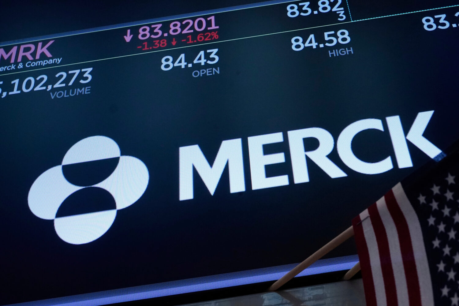 FILE - The logo for Merck appears above a trading post on the floor of the New York Stock Exchange,...