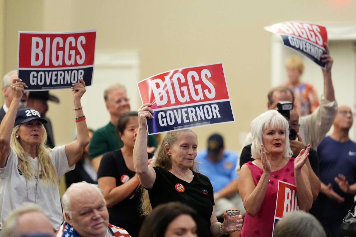 Supporters of Rep. Andy Biggs, R-Ariz., who is running in the primary for Arizona governor, listen ...