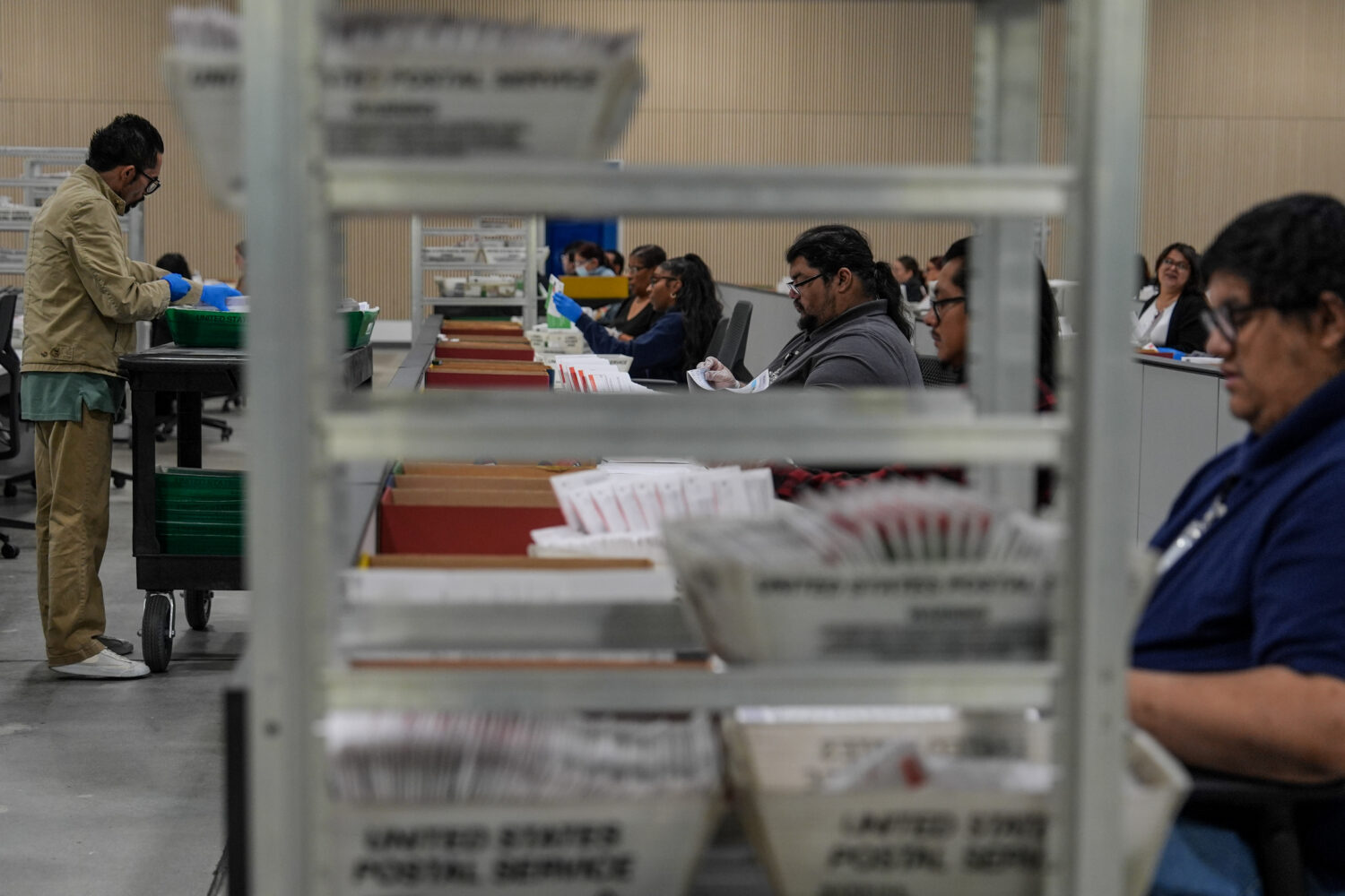Ballots are inspected the day after California's primary election at the Los Angeles County Ballot ...