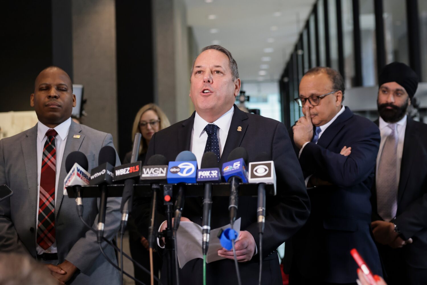 Douglas DePodesta, special agent in charge of the Chicago Field Office, speaks with reporters at th...