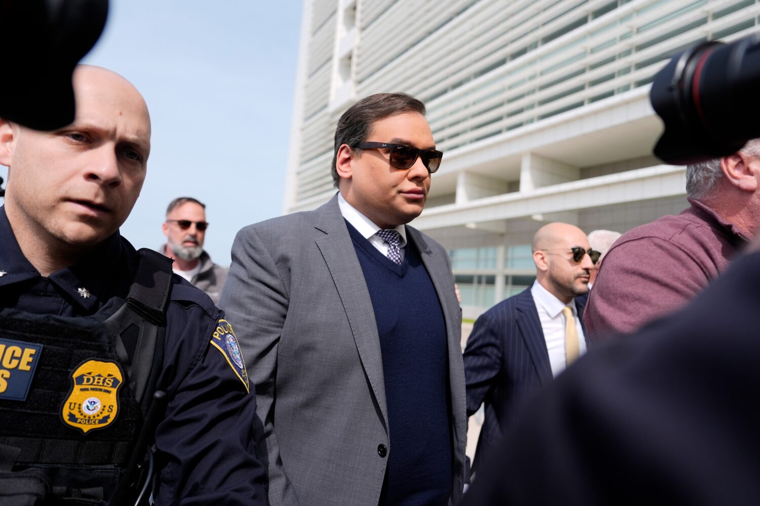 FILE - Former U.S. Rep. George Santos arrives at federal court for sentencing, April 25, 2025, in C...