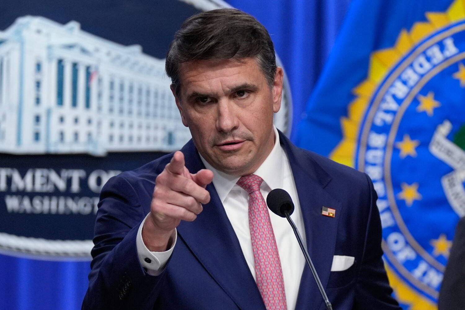Acting Attorney General Todd Blanche speaks during a news conference at the Department of Justice, ...