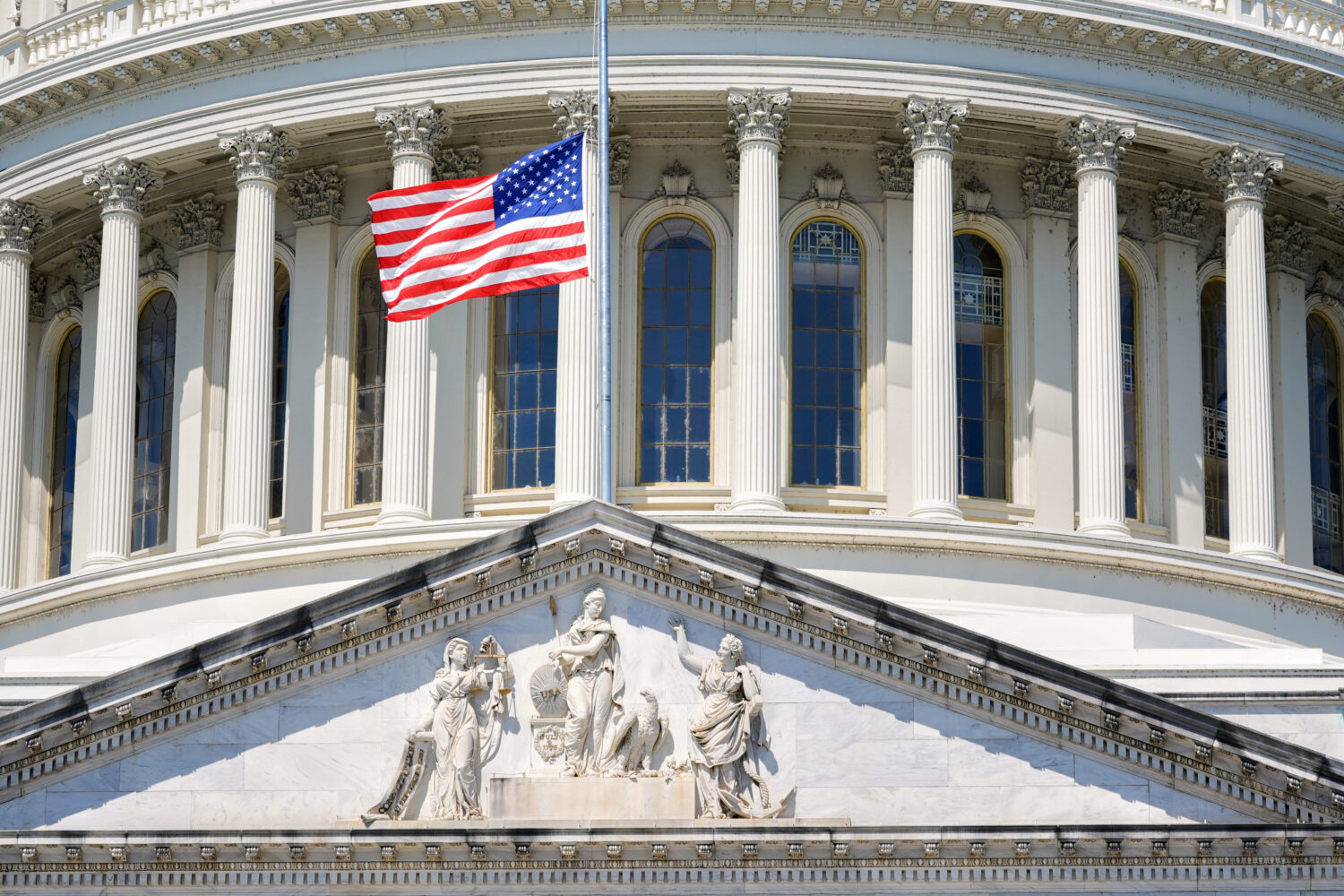 The U.S. flag flies at half-staff at the Capitol in Washington, Monday, July 13, 2026, after the su...