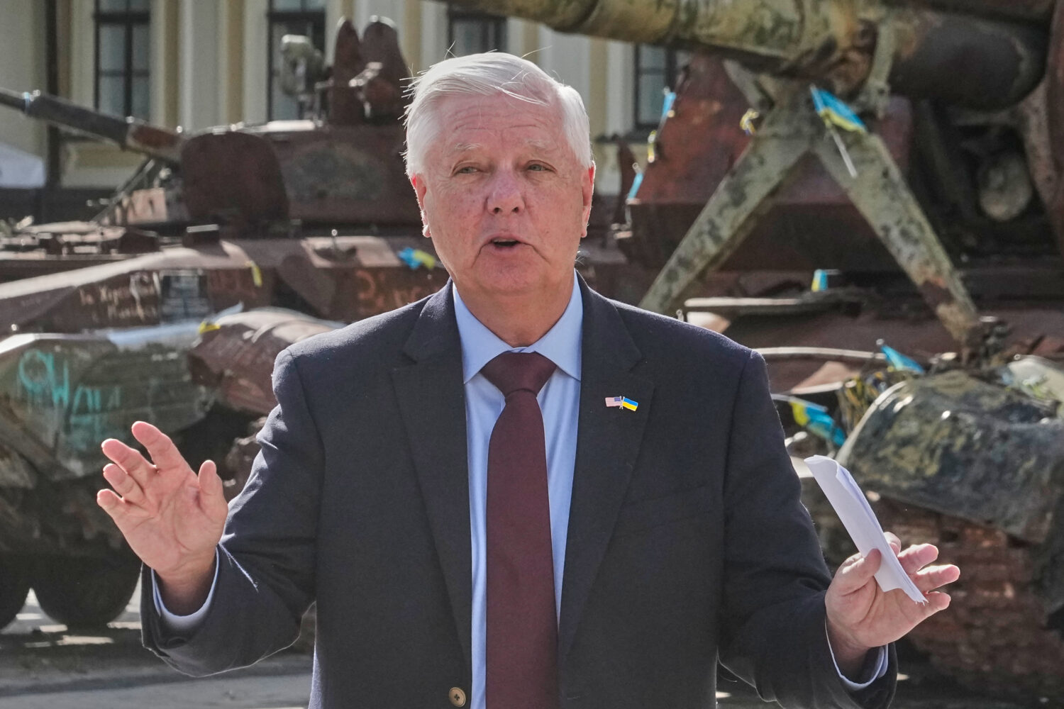 U.S. Sen. Lindsey Graham, R-S.C. answers a question from a media member near damaged Russian vehicl...