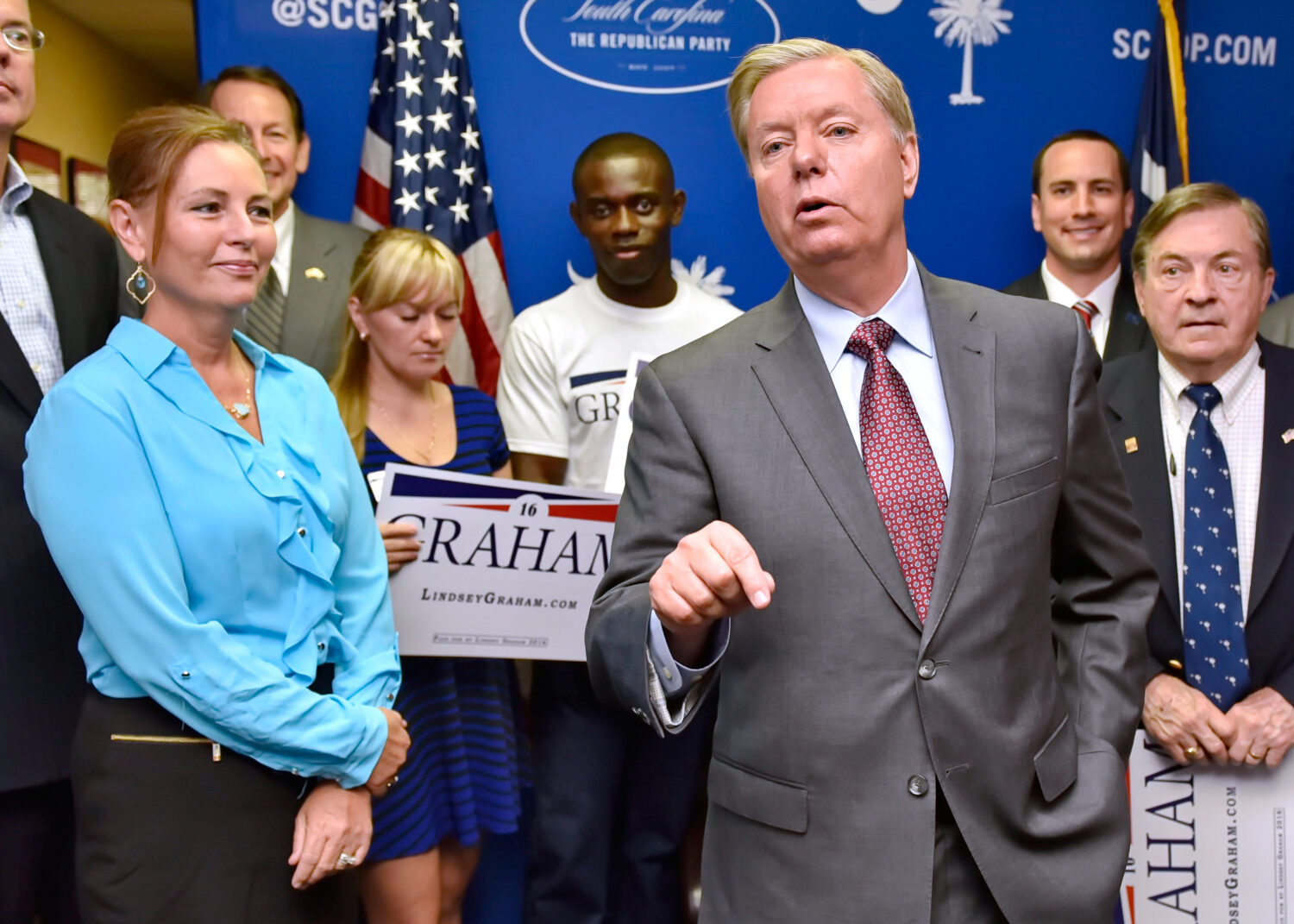 FILE - Republican presidential candidate, Sen. Lindsey Graham, R-S.C., accompanied by his sister Da...