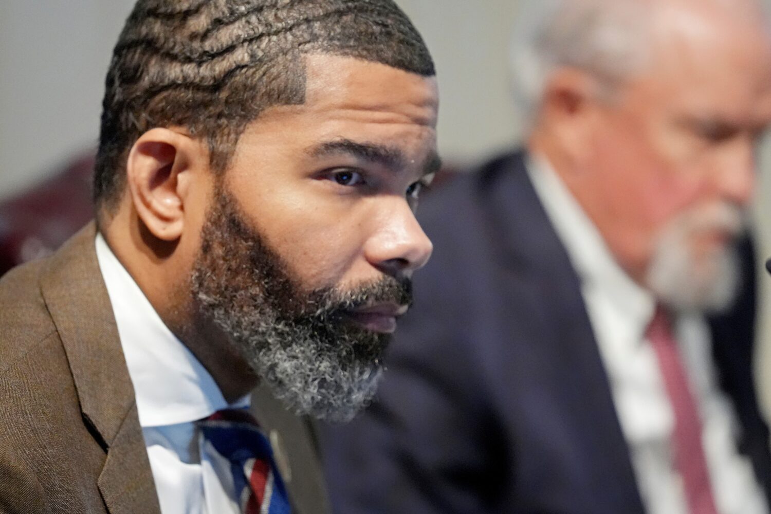FILE - Jackson Mayor Chokwe Antar Lumumba listens to the weekly Jackson City Council meeting at cit...