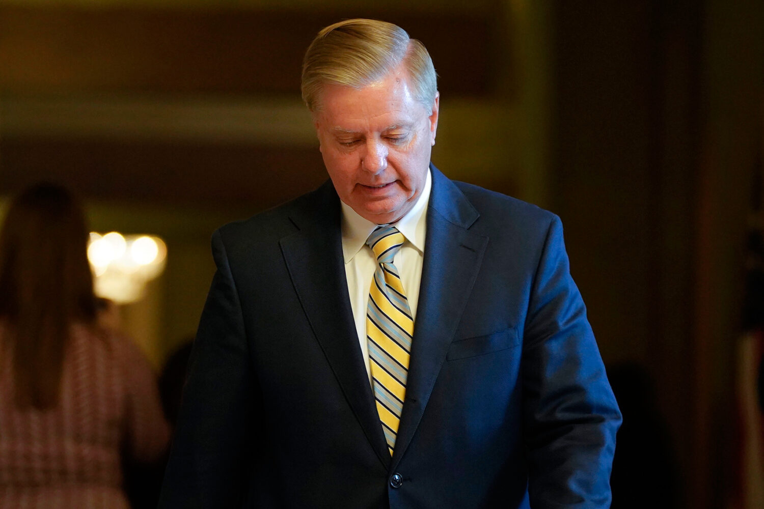 FILE - Sen. Lindsey Graham, R-S.C., leaves a meeting in the office of Senate Majority Leader Mitch ...
