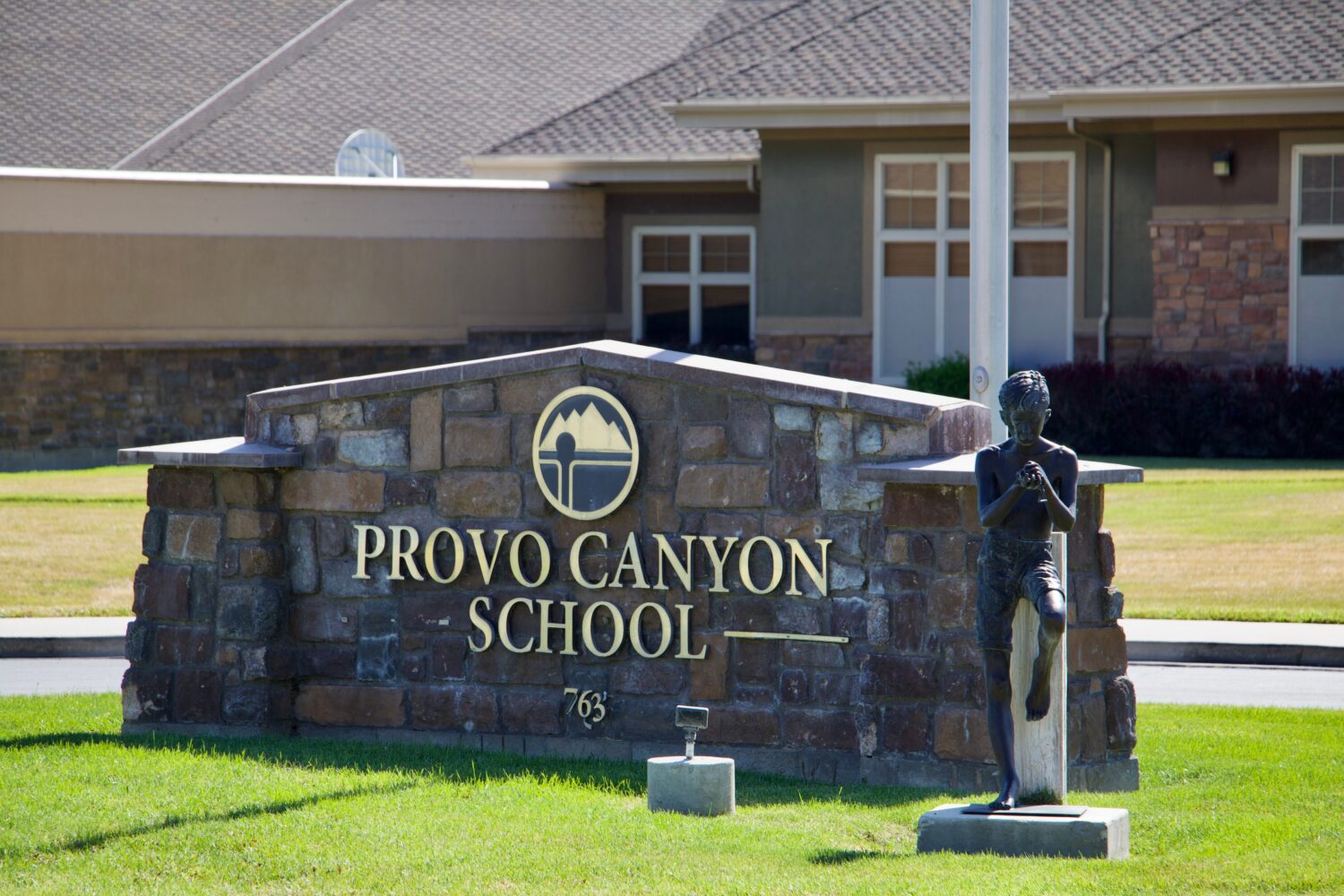 FILE -Signage for the Provo Canyon School in Springville, Utah, is pictured June 15, 2026. (AP Phot...
