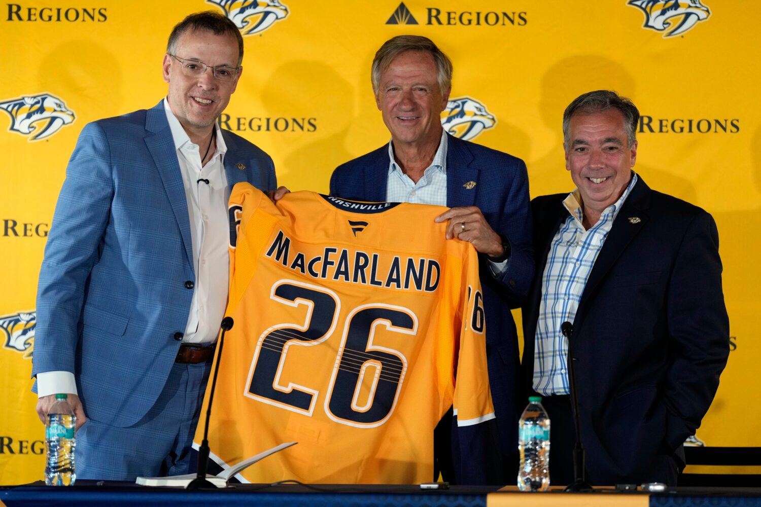 Nashville Predators new president of hockey operations and general manager Chris MacFarland, left, ...