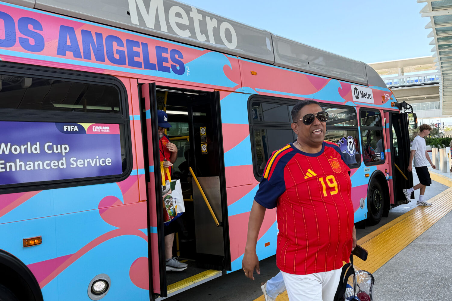 Fans exit a Metro shuttle after a World Cup match between Spain and Austria on Thursday, July 2, 20...