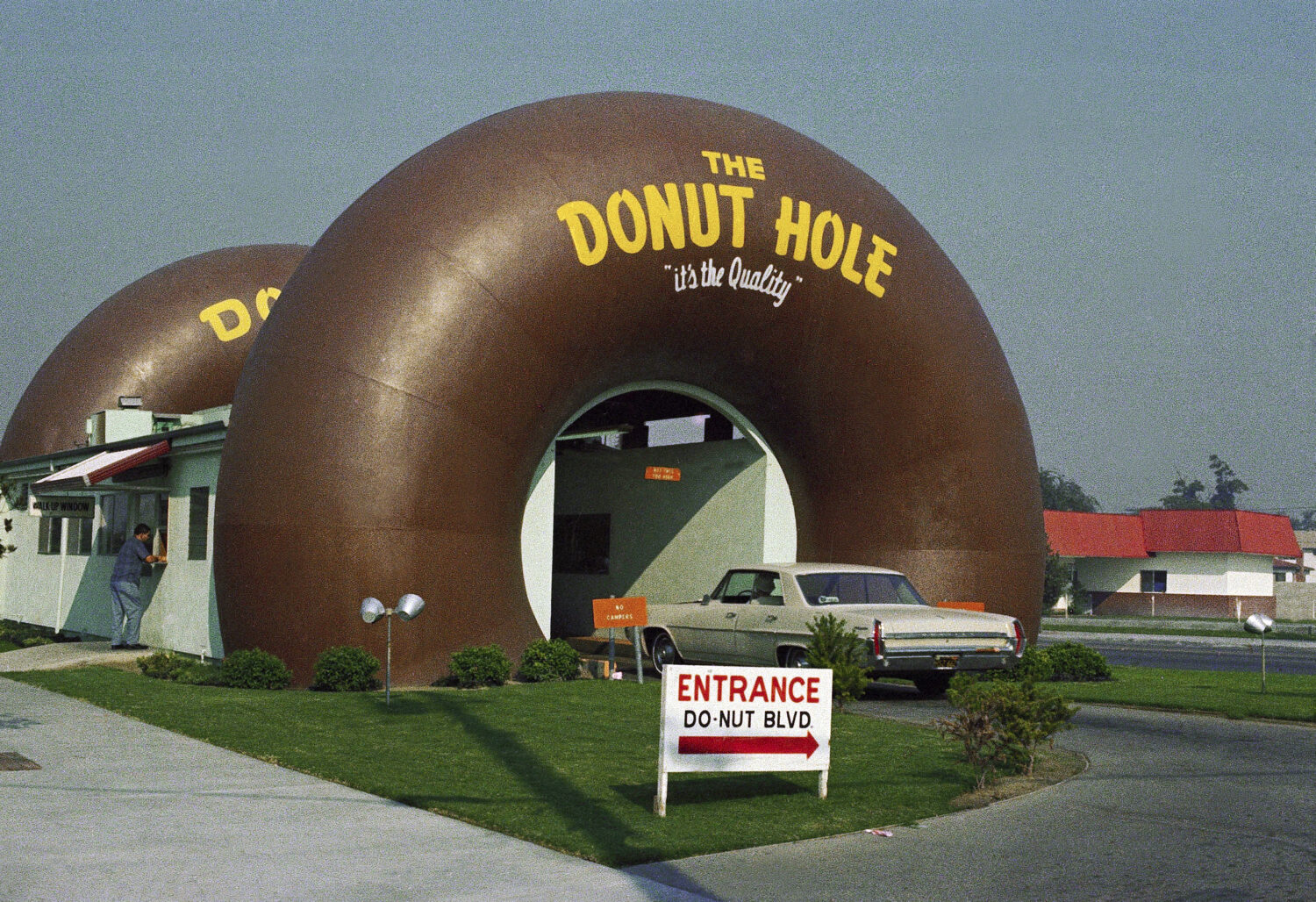 FILE - A drive-thru coffee and donut shop the Donut Hole is seen in Los Angeles in November 1970. (...