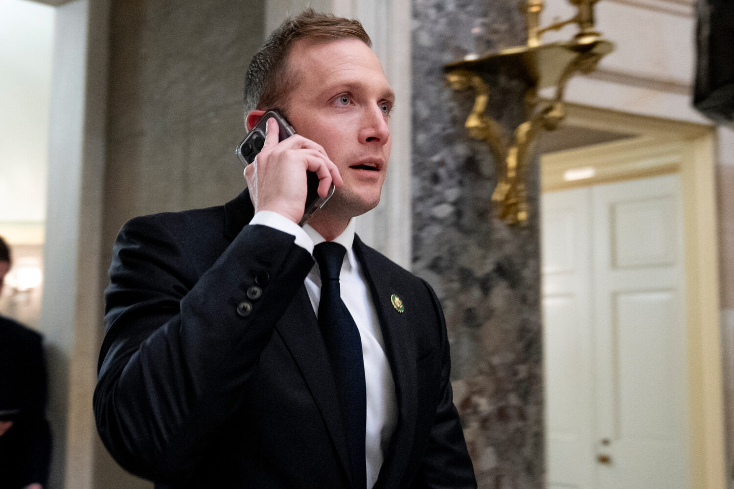 FILE - Rep. Max Miller, R-Ohio, walks out of a meeting with House Majority Leader Steve Scalise of ...