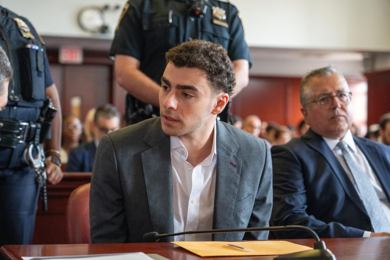 Luigi Mangione appears for a pre-trial hearing at Manhattan Criminal Court in New York, on Tuesday,...