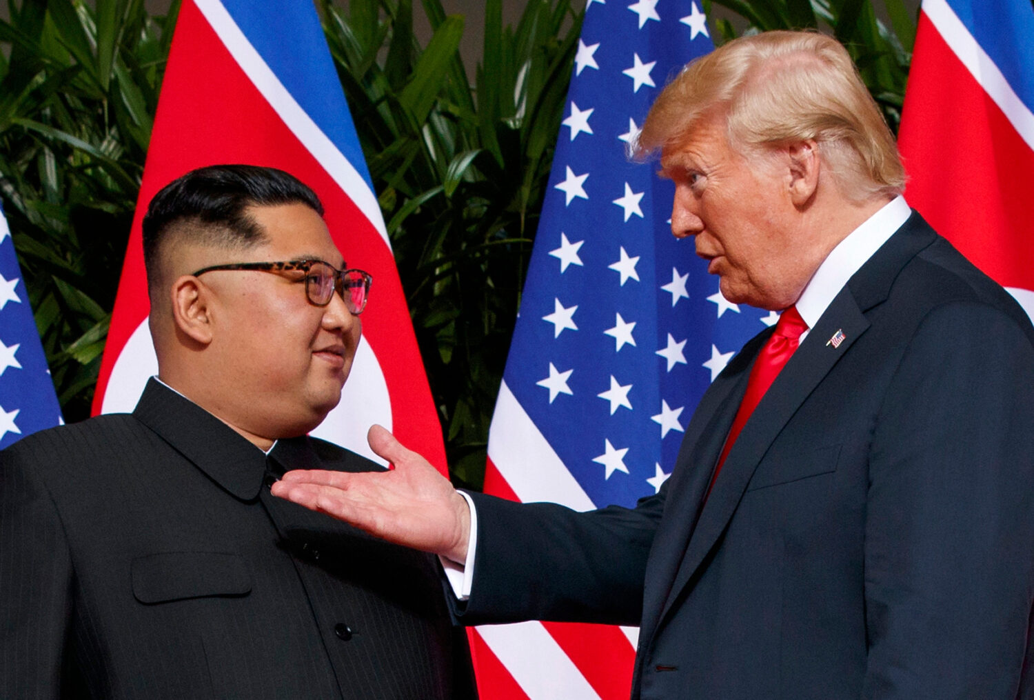 FILE - U.S. President Donald Trump, right, meets with North Korean leader Kim Jong Un on Sentosa Is...